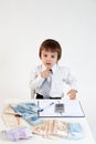 Young man, counting money and taking notes Royalty Free Stock Photo