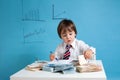 Young man, counting money and taking notes Royalty Free Stock Photo