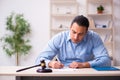 Young man in courthouse in divorcing concept Royalty Free Stock Photo