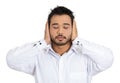 Young man covering his ears with hands Royalty Free Stock Photo