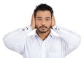 Young man covering his ears with hands Royalty Free Stock Photo