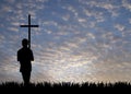 Young man with cross Royalty Free Stock Photo