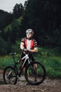 The young man cycling on mountain bike ride Cross-country Royalty Free Stock Photo