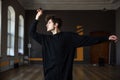 Young man dancing at gym