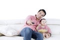 Young man and daughter watching TV Royalty Free Stock Photo