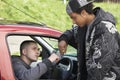 Young Man Dealing Drugs From Car Royalty Free Stock Photo