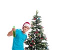 Young man decorating christmas tree isolated on white Royalty Free Stock Photo