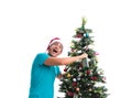 Young man decorating christmas tree isolated on white Royalty Free Stock Photo