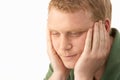 Young man deep in thought Royalty Free Stock Photo