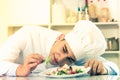 Young man is degustating salad Royalty Free Stock Photo