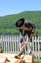 Young man demonstrating every day chores,Fort Ticonderoga,New York 2014