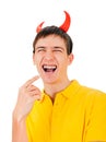Young Man with Devil Horns Royalty Free Stock Photo