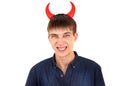 Young Man with Devil Horns Royalty Free Stock Photo