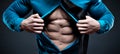 Young man displaying his abdominal muscles Royalty Free Stock Photo