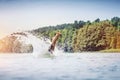 Young man diving into a lake. Royalty Free Stock Photo