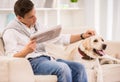 Young man with dog Royalty Free Stock Photo