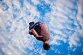 Young man doing backflip trick in the air Royalty Free Stock Photo