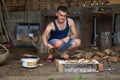 Young man doing a barbecue Royalty Free Stock Photo