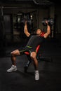 Young man doing bench press workout in gym Royalty Free Stock Photo