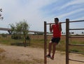 Young man doing body weight exercise.