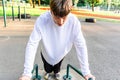 Young Man Doing Dips On Outdoor Exercise Equipment Royalty Free Stock Photo