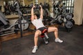 Young man doing Dumbbell Incline Bench Press workout in gym Royalty Free Stock Photo