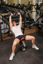 Young man doing Dumbbell Incline Bench Press workout in gym Royalty Free Stock Photo