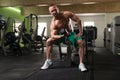 Young Man Doing Exercise For Biceps With Dumbbell Royalty Free Stock Photo