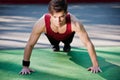 Young man doing fitness exercise