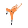 Young man doing kung fu fighting exercise. Energetic shaolin monk