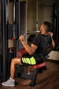 Young man doing lats pull-down workout Royalty Free Stock Photo