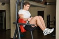 Young man doing lats pull-down workout Royalty Free Stock Photo