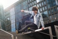 Young active man doing extreme parkour and stunts in the city Royalty Free Stock Photo