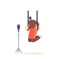 Young Man Doing Push-ups On Gymnastic Rings In Gym and Recording Video Tutorial of Workout Process, Vector Illustration