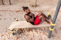 Young man doing sit-ups during workout in a calisthenics street workout park Royalty Free Stock Photo