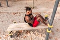 Young man doing sit-ups during workout in a calisthenics street workout park Royalty Free Stock Photo