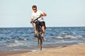 Young man doing wheelie Royalty Free Stock Photo