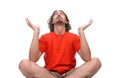 Young man doing yoga exercise Royalty Free Stock Photo