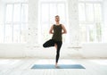 Young man doing yoga or pilates exercise Royalty Free Stock Photo