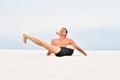 Young man doing yoga stretching Royalty Free Stock Photo