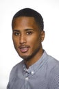 Young man in dress shirt isolated against white