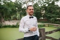 Young man with a glass of wine on the summer terrace in the cafe Royalty Free Stock Photo