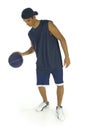 Young man dribbling basketball