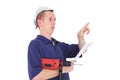 Young man with drill and paper hat Royalty Free Stock Photo