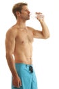 Young man drinking bottled water