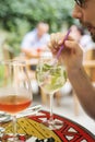 Young man drinking cocktail at the restaurant Royalty Free Stock Photo