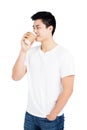 Young man drinking coffee from a disposable cup Royalty Free Stock Photo