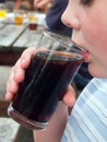 Young man drinking cola