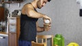 Young man drinking a smoothie drink or a protein shake Royalty Free Stock Photo