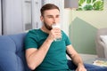 Young man drinking tasty milk